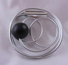 Swirl magnetic brooch