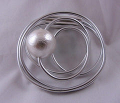 Swirl magnetic brooch