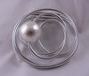 Swirl magnetic brooch